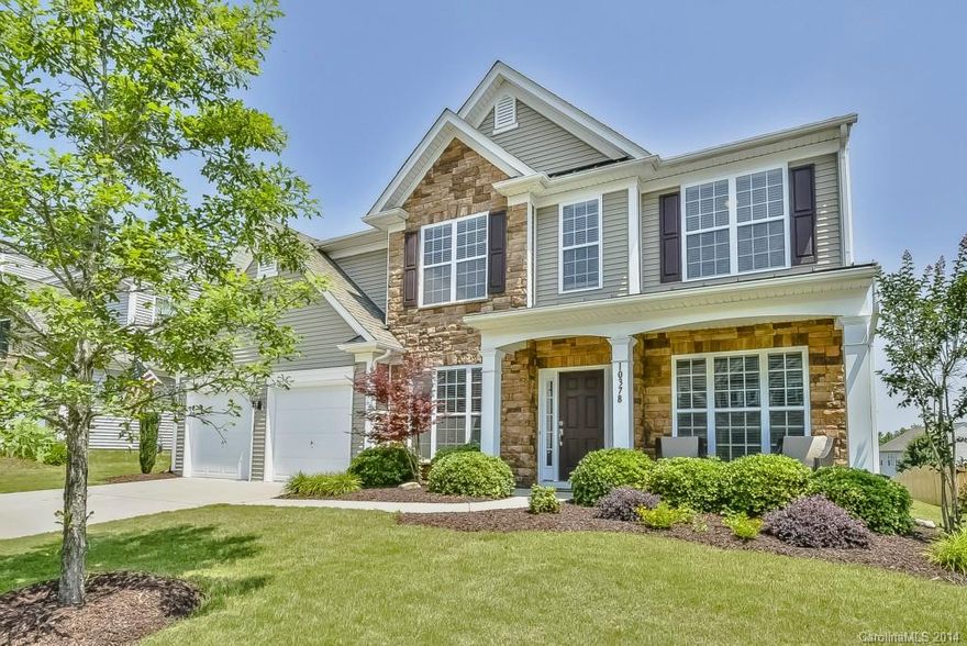 Like new, pristine home ready for you!  This home boasts wood floors throughout main level w/ an open floor plan, high ceilings & a home office w/ french doors.  Enjoy cooking in the chef's dream kitchen w/ granite & stainless including island breakfast bar & desk niche or unwind in your huge master w/ custom closets. This home has it all! Neutral colors, large bedrooms & plenty of storage make this home move in ready!  Step outside & enjoy the well manicured lawn or sitting on the front porch!