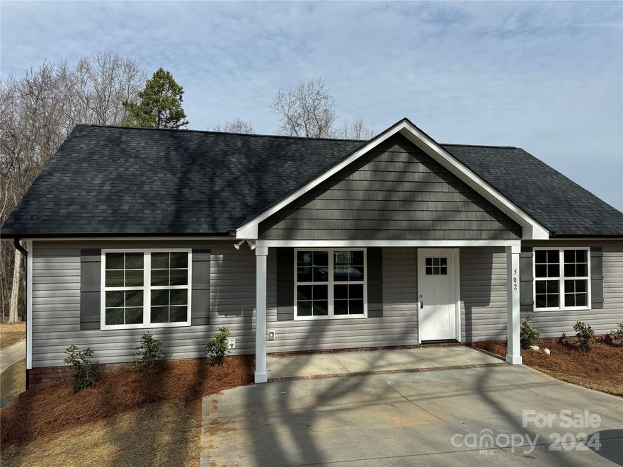 New construction! The kitchen features custom-built cabinets with Shaker doors, and granite countertops in the kitchen & baths. Nice baseboards and trimmed-out windows. LVP Plank Vinyl flooring in Great Room, Dining, Kitchen, Breakfast, Laundry, and all baths; carpet in bedrooms. Stainless steel appliances included: dishwasher, microwave, and smooth top range. There are many upgrades for this price point, including custom finishes. Ready to Move-in. Minutes from downtown Kannapolis & major highways.