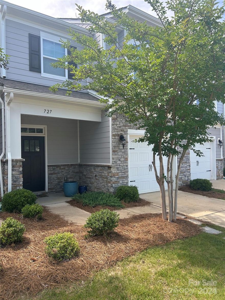 Welcome to the Village at Ivy Ridge in Lake Wylie, Close to the lake and easy access to Charlotte which is only 30 miles away. 3 bedroom 2.5 bath features an open floor plan with a nice sized kitchen with granite countertops, subway tile backsplash, pantry, and large island with seating for entertaining. The main floor has 1/2 bath. The primary bedroom is on the 2nd floor with an ensuite featuring dual sinks, granite vanity, linen closet, large tile shower with seat, and a large spacious walk-in closet.   Two additional bedrooms are upstairs with a full bath and laundry room. 1 car garage.   There is a nice fenced-in patio with landscape lighting. Community amenities offer an outdoor pool, clubhouse, picnic/grilling area, playground, gym, and Bocce & Pickle Ball courts.   Take a look and make this your new home.