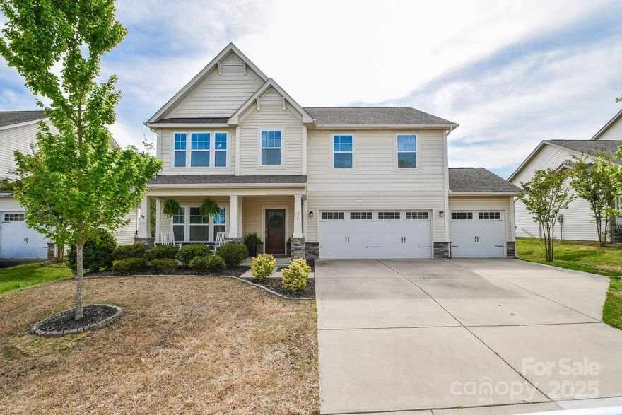 Hard to find five-bedroom residence in beautiful Locust-just south of the Cabarrus County line. This stately home features flowing open floor plan with eating area, bar seating, and formal dining room, complete with Butler's pantry. Downstairs bedroom and full bath is a plus, and hallway from garage sports a "drop zone" for your bags, books, coats, etc. The bedrooms upstairs all have walk-in closets and there is a loft for extra living space.  The primary suite is something out of a magazine. I don't usually take pictures of closets, but this primary closet is so big, that I almost got lost in it! Three-car garage has room for shelving and storage and owners will leave the wooden workbench, if buyers desire. Outside features include rocking-chair front porch, covered patio and fenced in back yard. Schedule your appointment today!