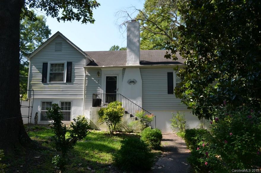 Charming home in Yorkchester Historical District has an English cottage feel. A spacious living room and also a comfortable den are off the large foyer.  All 3 bedrooms have bathroom access.  In the lower level you will find a wonderful sunroom with ceramic tile floors that is heated and cooled.  There's also a deep one car garage with plenty of storage area.  The garage is also heated and cooled.