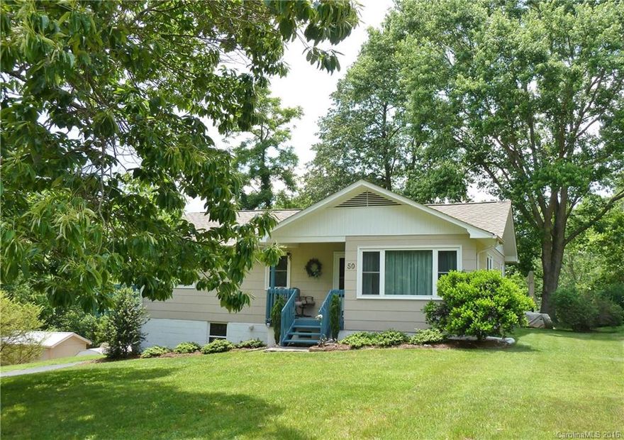 4 Bedroom 1 ½ bath -Hardwood floors - updated eat in kitchen – lower level has an office -family room area- bedroom-brand new half bath and workshop.  A great lot that totals .46  fairly level yard for your garden. This home is conveniently located just four minutes from downtown Asheville. Energy efficient windows, added insulation, 30-year vented roof, and freshly sealed driveway make this home move in ready. See MLS #3162562