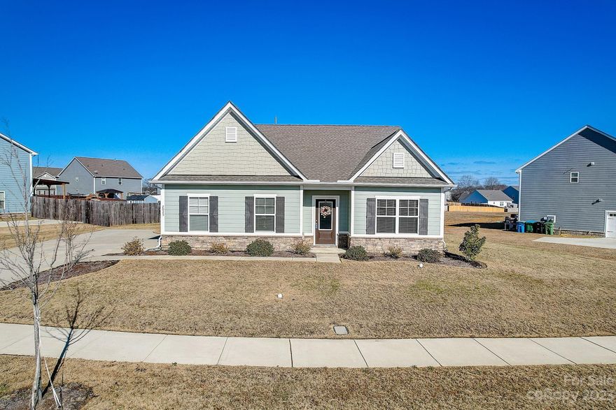 Like new, charming ranch home in the sought after Stratford neighborhood! Highlights include large windows, a huge island, modern white cabinets, a complete suite of stainless-steel appliances, granite countertops and a large pantry. The kitchen overlooks the living room and is perfect for entertaining.
The primary suite boasts a large walk in closet and gorgeous ensuite with dual sinks and glass surround shower. This neighborhood is close to shopping, dining and just a short drive to Charlotte. Great Union County Schools!