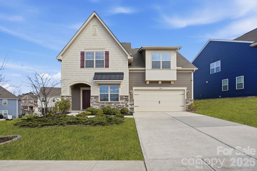 Highly desired Tega Cay address in the award-winning Fort Mill School District, located in the sought-after Windhaven community. Situated just outside of the peninsula and a short distance from award-winning Tega Cay Elementary School, this home offers the perfect blend of convenience and community. Parks, walking trails, golf, and the lake are all just moments away, making it easy to embrace everything that makes Tega Cay so special.

Perfectly positioned on a private corner lot beside a neighborhood open space, this two-story home offers exceptional privacy, abundant natural light, and a long, uninterrupted walkway in front that enhances its welcoming presence. With sunlight streaming in from multiple sides year-round, the home feels bright and airy in every season.

Just off the foyer, a dedicated office provides flexibility, ideal for working from home, a quiet reading retreat, or even a music room. The open-concept kitchen is the heart of the home, featuring a large island designed for barstools, conversation, and connection. Crisp white cabinetry paired with neutral quartz countertops create a clean, bright aesthetic that feels timeless and inviting. The kitchen flows seamlessly into the family room and dining area, making entertaining effortless and comfortable.

Tucked privately on the main level, the primary suite offers a peaceful retreat with a spacious bedroom, spa-like bath, and generous walk-in closet.

Upstairs, the expansive loft provides endless possibilities for movie nights, game days, karaoke with friends, or the ultimate playroom. A large bedroom with en-suite bath offers the flexibility of a second primary suite, while two additional bedrooms are impressively spacious and share a well-appointed third full bath, ensuring comfort and room for everyone. The upstairs laundry room adds everyday convenience exactly where you need it.

Outside, the generous side and rear yard provide ample space to play, entertain, garden, or simply relax and enjoy the added privacy of this corner lot.

Space, flexibility, natural light, and location — all just minutes from everything that defines The Good Life in Tega Cay.