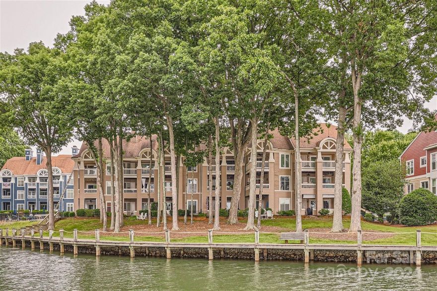 Prepare to be captivated by the breathtaking waterfront views of Lake Norman from the covered balcony of this penthouse. This exceptional 2-bedroom condo presents a rare and highly sought-after 2nd level loft, providing ample space for entertainment and leisure. The kitchen has been tastefully updated with exquisite quartz counters, cabinets and a generously sized island. Notable features include gas logs and a vaulted ceiling in the living room, adding a touch of sophistication. The community offers tennis courts and a private pickleball community, ensuring a plethora of recreational options. Step outside and immerse yourself in a world of outdoor activities, including an invigorating saltwater pool, scenic boardwalk trails, and thrilling water adventures with a Kayak launch. Conveniently located near downtown Davidson, renowned for its superb shopping, dining, and year-round social events. All appliances, including the refrigerator, washer, and dryer, will remain with the condo.