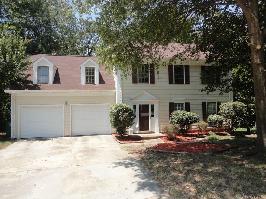 Lovely 3 bed 2.5 bath home with large bonus room. Home freshly painted with newer carpet.  Large screened in rear porch overlooking very wooded private lot.