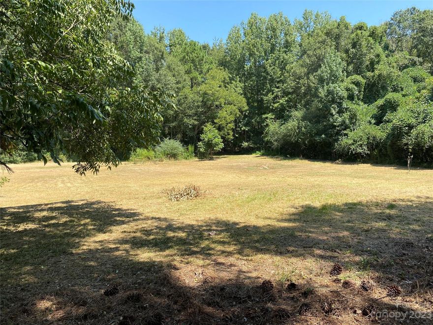 Come design your dream home on 7 acres. Perfect for homesteading with raspberry bushes, fig tree, mature pecan trees, black walnut tree, apple tree and pear tree. Barbed wire and electrical fence surrounds the property. Land also features a shed, chicken coop, quail house, fenced garden area, and greenhouse. The property has an unfinished renovated house that is expected 2 bedroom 1 bath with new electrical, plumbing, and windows. Sold as is. House could be remodeled or torn down for a future build.