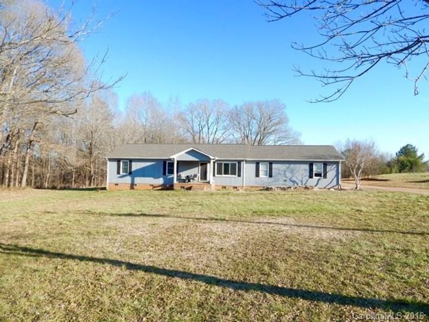 New roof, carpet, paint, windows in 2015. Attached garage has been turned into finished bonus room.  Eat in kitchen w/lots of cabinets open into the den. Master bedroom with large walk in closet, private bath with dual vanities. Ready for your finishing touches. 1800 sf workshop with electricity and water, RV/boat storage with electricity.