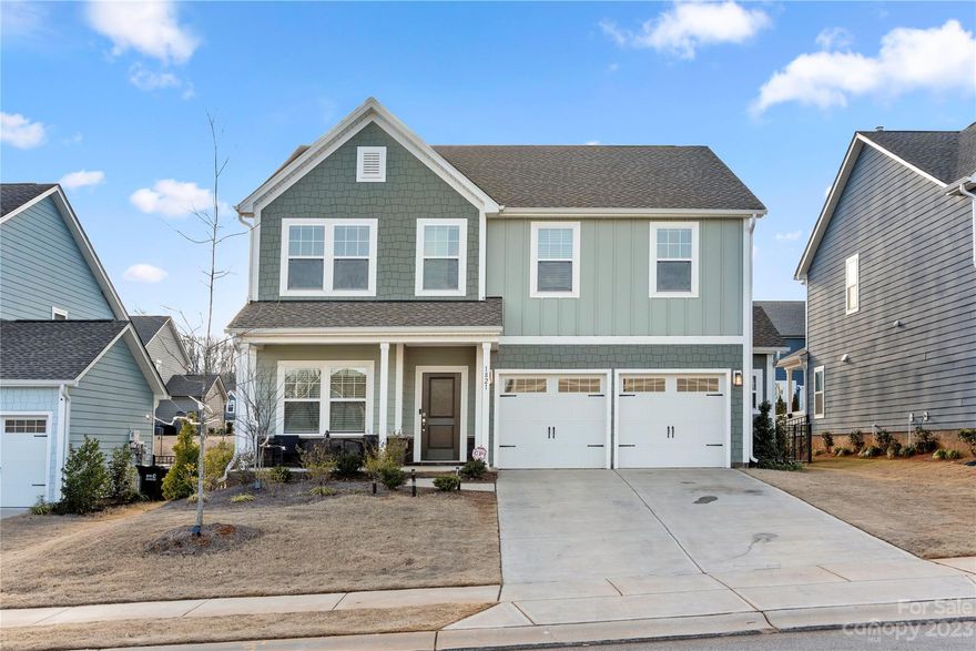 Welcome to The Manors at Handsmill, a gated community on Lake Wylie. This gorgeous, well maintained, newer construction, 4 bed, 2.5 bath home features a spacious open floorplan perfect for everyday living. Foyer leads to office/flex space with french doors. Dining room has separate area that opens to a fabulous, upgraded kitchen featuring large center island, beautiful tile backsplash, pendant lighting, stainless steel appliances and more.  Upstairs has great loft area, 4 large bedrooms with walk in closets.  Primary bedroom has tray ceiling, luxury bath with separate shower and huge garden tub, quartz countertops and dual vanities. Walk out back to an extended patio great for entertaining and a fenced back yard. Handsmill features many amenities including marina access, pool, playground, clubhouse and more!