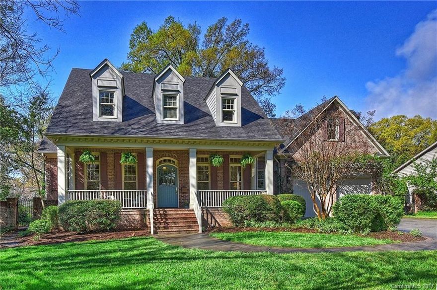 Beautiful home on a level, sunny lot. Wide-cased openings, 11' ceilings, floor-to-ceiling windows create an open floor plan. Natural light comes streaming in. Lovely kitchen/ brkfast room overlook the private yard. Downstairs master suite has a renovated bath & huge closet. Nicest family room you'll ever see w/French doors to a covered porch & big deck. Tremendous rec room in the heart of the 2nd floor. 2nd bonus used as a 5th bedroom. Walk-out attic storage. Short commute to Uptown & SouthPark.