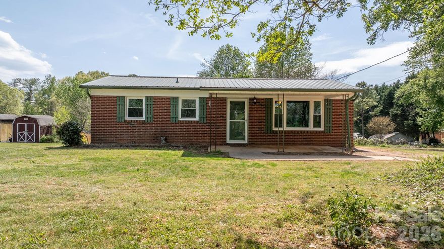 Charming 3-bedroom, 1-bath brick ranch ready to welcome you home. Inside, you’ll find an open-concept living area with fresh paint throughout and a comfortable flow that is perfect for everyday living. Per the seller, the metal roof, HVAC system, and windows were all replaced in 2022, and a new electric water heater was installed in 2023. The kitchen features a cooktop, wall oven, dishwasher, and refrigerator. The washer and, dryer will also convey with the property. Outside, enjoy a spacious yard with plenty of room for entertaining, grilling, gardening, and more, along with a welcoming front porch to relax and unwind. This is a wonderful opportunity to own a place to truly call home.