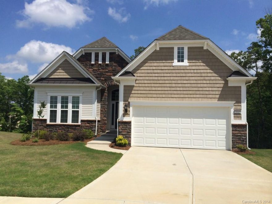 INSTANT EQUITY! Priced thousands less than new! Sellers have over $500,000 invested in this home.Basement home nestled on a golf course view & wooded cul-de -sac homesite.Relax in the sunroom,create in one of the multi use rooms, stunning HW floors, Gourmet kitchen w/ SS appl, gas cooktop, tile backsplash, FP in GR. Perfect open floor plan for entertaining & separate space for out of town guests.