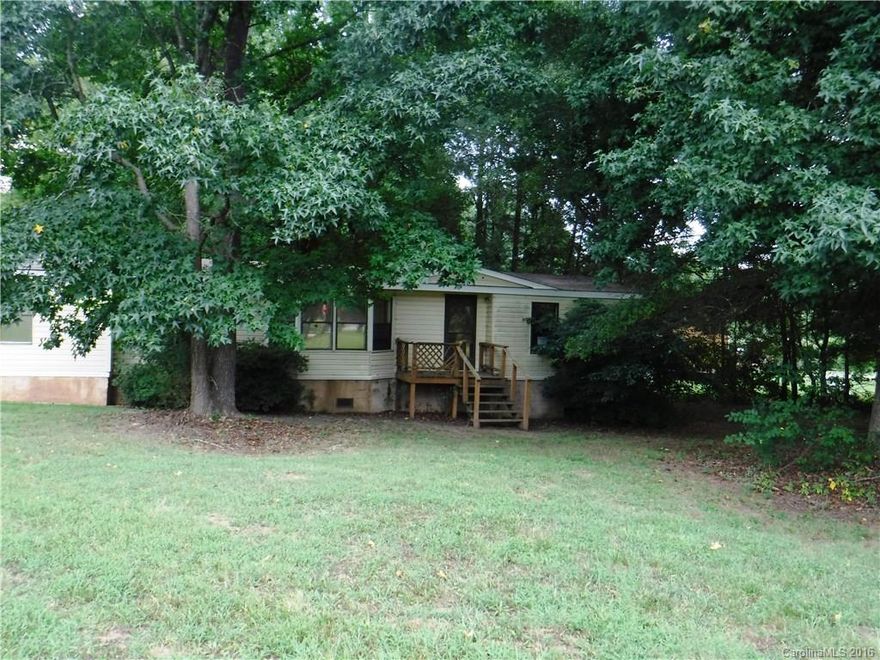 Nice corner .75+/- Acre lot. Foreclosure - sold as is. Home needs a lot.