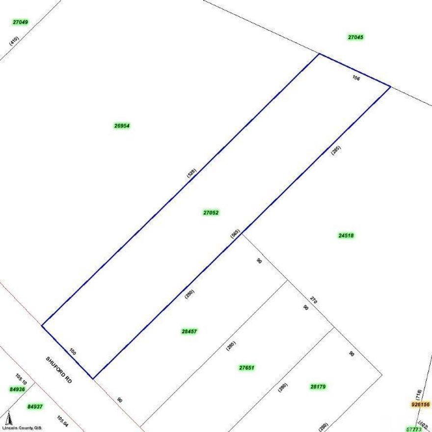 Wooded lot in great school district with road frontage!