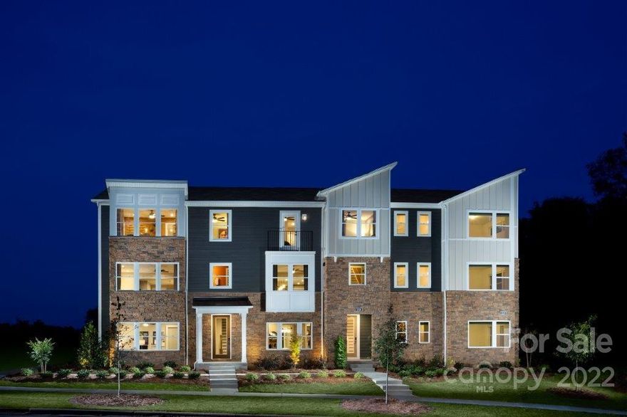 Modern style townhome with lots of stone and windows located in the University Research Park.  This home includes 4 bedrooms, 3.5 bath with large 2 car garage.  First floor offers guest suite and full bath.  The second floor has a large kitchen and family room with private balcony off back.  Perfect for entertaining.  Third floor will have owners suite with owners private bath and 2 guest bedrooms with hall bath.
Community will have private pool and cabana.  Close to uptown Charlotte and airport.  Shops and restaurants close by.