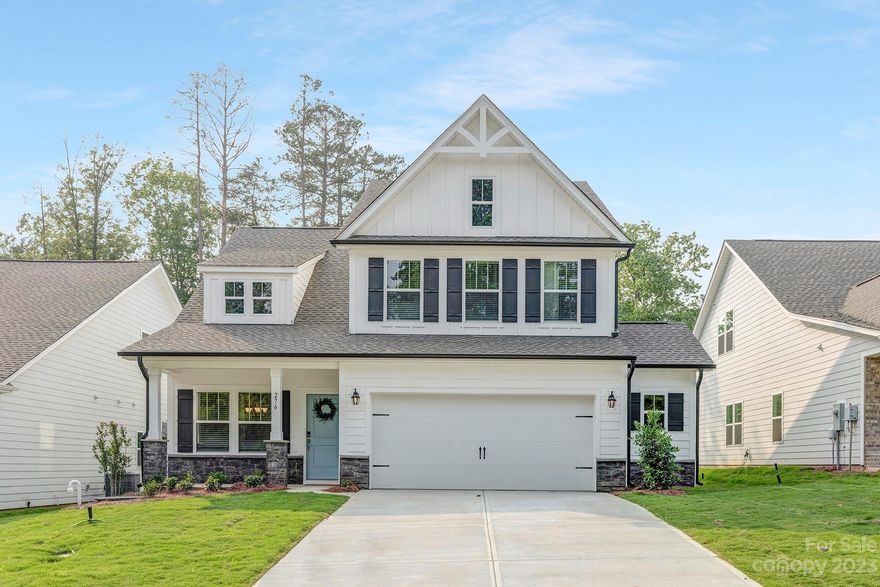 NEW 3BR / 3.5 BA in desirable Lake Tillery community! The Tate is a well-appointed home with owner's suite + ensuite on main level.  Home features stylish kitchen with upgrades, spacious great room and open dining! Kitchen boasts upgrades like tile back splash, quartz countertops, cabinetry, and more! Second level features spacious secondary bedrooms, 2 full baths, loft area, and unfinished bonus room.

The Tillery Tradition Country Club, the hidden gem of the Uwharrie Mountains, is a beautiful 18 hole course offering tees that range from 4668 yards to 6930 yards which makes the course very suitable for all types of players. Also onsite is the gorgeous Tillery Tradition Clubhouse complete with it's own restaurant - The Eagles Nest. The country club also features lots of beautiful and relaxing outdoor seating and gathering spaces as well as a large swimming pool for those hot summer days. Membership to country club is separate; golf course and pool are NOT included with the HOA dues.