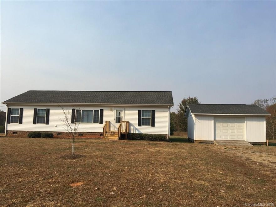 Completely renovated 3 Bedroom/2 Bath modular home on a nice level lot. Split floor plan, laminate hardwoods in the main areas, and large master suite with walk-in closet! 20 x 20 large detached building/workshop! Great property!