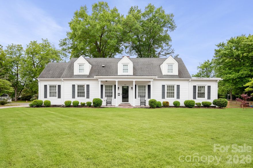 Located in the heart of charming of Landis, this stately four bedroom home has been beautifully remodeled for buyers with impeccable taste who are seeking a truly move-in ready property. Featuring beautiful hardwood flooring, neutral paint throughout, lovely updated bathrooms and a massive kitchen with plenty of room to host Thanksgiving and Christmas for the whole family, this home offers both elegance and comfort. This home has a nice living space upstairs with bedroom, bathroom and plenty of bonus space for kid or adult play! In addition, there are multiple walk-in attics for tons of storage space. On the main level there are two living spaces, a dining room and beautiful office space/or bedroom with it's own bathroom. The master bedroom is large enough for a seating area and has "his and her" closets.  There is a cedar storage closet on the main level for a broom closet, linen closet and added nostalgia. The den has built in shelving and opens to the kitchen. The Living Room also has lovely built-ins and a fireplace and is open to the gorgeous formal dining room. An oversized, freshly painted deck with flower boxes overlooks the fully fenced back yard of this large half acre lot. This fabulous yard features raspberry, blackberry and blueberry bushes, a strawberry patch and garden beds. There is a charming garden shed PLUS a very nice concrete floored shop for hobbies or garage type storage. You will love the fabulous greenhouse with electricity and heat for anyone interested in gardening in addition to an amazing rain barrell! Do not miss this well maintained home with an encapsulated crawl space and just a ton of extras!