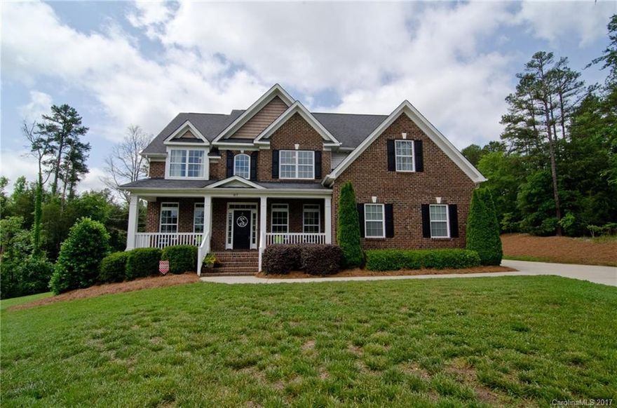 Awesome custom home on over acrea cul-de-sac lot in award winning Clover School District! Coffered ceilings, trey ceilings, paver patio surrounds fire pit, gourmet kitchen, 5 bedrooms, 3 full baths, oversized bonus room, bedroom on main floor, formal dining, office/formal living flex space, covered front porch with slate floor. Too much to list! Quiet neighborhood but county feel close to city conveniences!