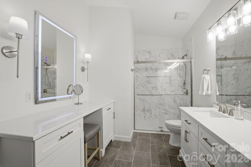 This well-maintained 2-bedroom, 2-bathroom plus flex room (can serve many uses: study, guest space, playroom, etc) end-unit condo offers almost 1500 square feet of comfortable living in one of Cornelius's most convenient communities. Second-floor living means vaulted ceilings, no noisy neighbors above, and an open floor plan that creates a bright, spacious feel throughout. The primary suite includes a fully renovated en-suite bathroom. Bonus spaces provide flexible space for a home office or guest room as well as the covered back porch which also has convenient storage. The living room features a wood burning fireplace and flows into the dining area and kitchen that features stainless steel appliances. Community amenities include a clubhouse, fitness center, outdoor pool, reserved parking, and easy Greenway access (you can walk to Birkdale in about 20 minutes). HOA covers water, trash, sewer, exterior repairs, and lawn maintenance, and the building has a newer roof. Top-rated schools and centrally located to provide easy access to all that Lake Norman and Charlotte offer!