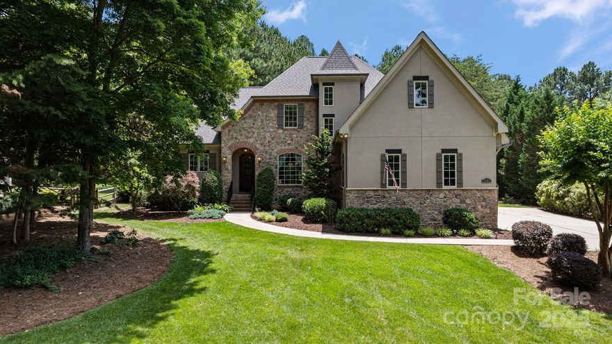 Tucked away in a quiet cul-de-sac, this stunning home in Northview Harbour captivates from first glance with its stately stucco and stone exterior and meticulous curb appeal. Situated on over an acre, privacy and serenity abound. Inside, enjoy an elegant open floor plan with oversized windows, tray ceilings, custom millwork, and a seamless flow from the living room to the chef’s kitchen. Step outside to your private backyard retreat—complete with an outdoor kitchen, fire pit, and expansive patio perfect for entertaining. Whether you’re dining al fresco or cozying up under the stars, this outdoor space delivers. The exclusive community offers amenities for every lifestyle, including pickleball, pool, clubhouse playground and more. Don’t feel like cooking? Hop on your boat at your deeded slip and explore lakeside dining just minutes away. Luxury, privacy, and lifestyle come together in this remarkable home. This is Lake Norman living at its finest.