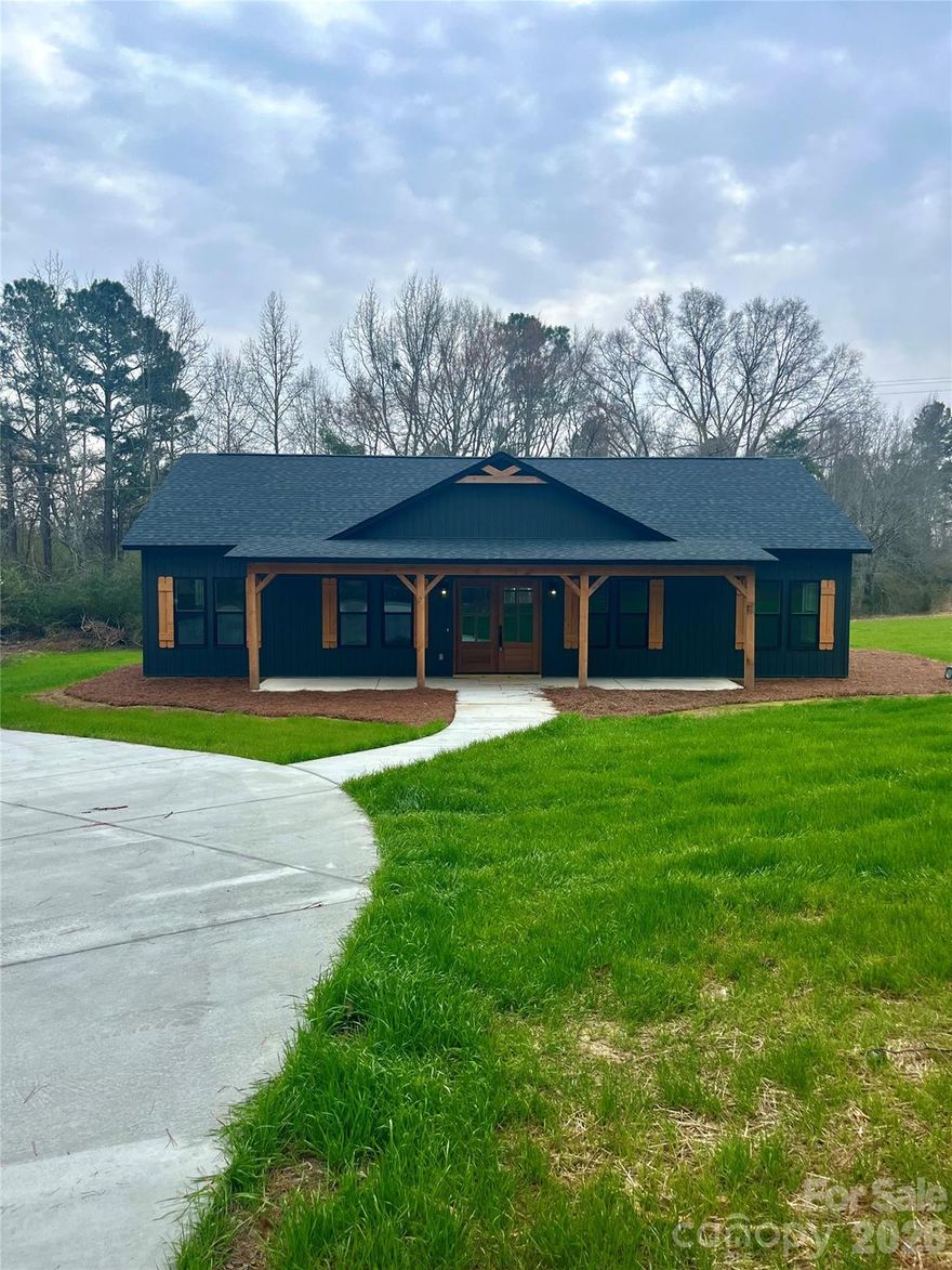 Welcome to your future home in Lancaster, SC! This brand-new construction offers the perfect blend of modern living and peaceful country charm. Nestled on over an acre of land, this home is currently being built and still offers time for customization — giving you the unique opportunity to make it truly your own.
The home features approximately 1,500 square feet of well-designed living space with an open-concept layout that’s perfect for everyday living and entertaining. With 3 spacious bedrooms and 2 full bathrooms, there’s room for everyone to spread out and feel at home.  Enjoy the quiet surroundings and the freedom of extra land — whether it’s   a garden, outdoor entertaining space, or simply enjoying the view. Built with quality and care, this home will offer energy-efficient features, modern finishes, and a layout designed for comfort.  Don’t miss out on this rare opportunity to own a custom-ready, new construction home in a growing area.