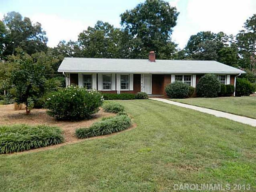 MOTIVATED SELLER!  Quality built home!  Beautifully refinished Hardwood Floors shine like glass!  Three bedrooms, 2 baths, living room, dining room combination, eat in kitchen, nice den, full basement with fireplace has  heat & air but unfinished just waiting for you to make it whatever room you want it to be.   Nice patio overlooking lush landscaping.  Basement garage.  Convenient to everything.