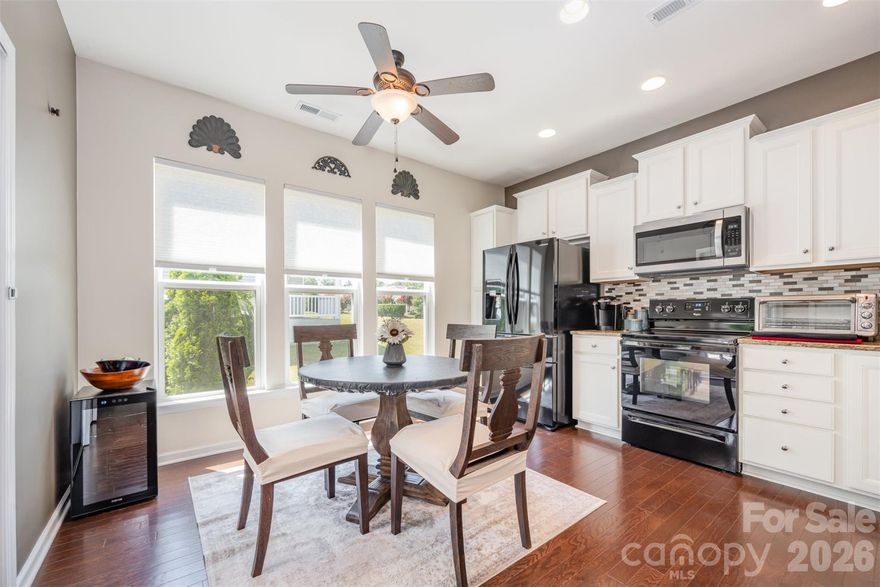 Welcome Home! You'll love this easy to maintain home in the popular and friendly Whimbrel Circle neighborhood of Sun City Carolina Lakes. This Pine Spring floor plan offers wood floors throughout, three bedrooms, two baths, formal dining, and eat-in kitchen. Enjoy the outdoor space for entertaining or to enjoy your morning coffee.  This home sits on a large corner lot with beautiful landscaping. Carolina Lakes is an amenity-rich active adult community that offers 2 outdoor pools, 1 indoor pool, exercise facility, woodworking/stained glass studio, pottery studio, billards, clay tennis courts, pickleball, shuffleboard, bocce, hiking trails, and 160+ interest groups and clubs. Come and enjoy your retirement in this beautiful, easy to maintain home in beautiful Carolina Lakes. Buyer pays New Member set up fee and 1/3 of 1% of the purchase price for HOA Capital Contribution.