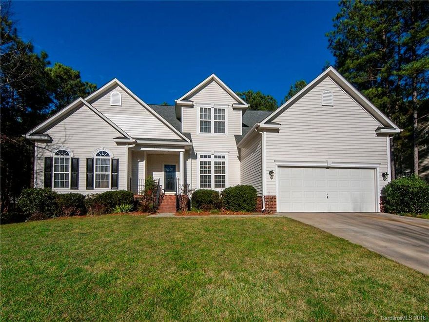 This woods view, lake community home with FREE boat storage has new paint & brand new floors w/plenty of places to entertain including a fully wired screened in porch w/hot tub. Take in a game of pool in the oversized bonus room or cozy up by the fire. Loads of storage w/2 attics. In summer months this neighborhood is full of activity: including a pool w/a cabana facility, grills, & picnic & private beach area, plus a picnic pavilion w/fire pit/grills, & a lakeside boardwalk w/rocking benches.