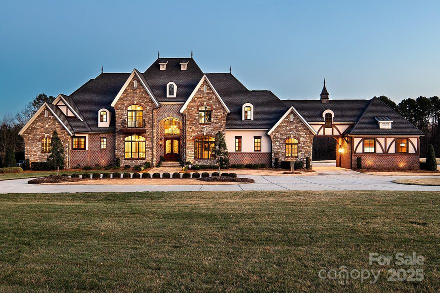 Your Dream Home Awaits! Step into this breathtaking custom estate, where elegance meets comfort. Imagine cooking in your chef’s kitchen, complete with a massive island, custom cabinetry, and top-tier appliances. Host unforgettable evenings in the inviting living space, then unwind in your spa-like primary suite retreat. But wait—the best part? The outdoor paradise! Grill in your fully equipped outdoor kitchen, relax by your outdoor fireplace and soak in the twilight views. Nestled in the heart of Gastonia, this home is the one. Don’t let it slip away! There is an additional 50 acres that are available.