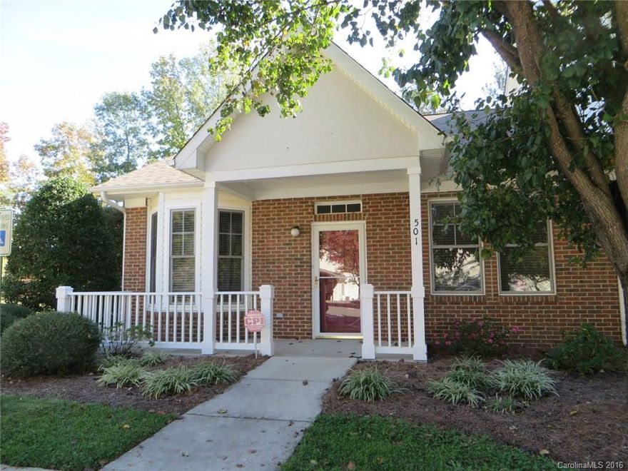 Enjoy easy single-story living w/ this END UNIT condo in the heart of Ft Mill! Very livable floor plan w/ large Great Rm accented by vaulted ceiling, bay window & corner fireplace. Kitchen has lots of cabinet/counter space, smooth cooktop range & tile flooring. DR opens to a private, rear porch. Outside storage closet. Master BR has private bath, good closet space & pretty backyard view. The front BR has is shaded by a large oak. You'll love the tucked-away location & rocking chair front porch.