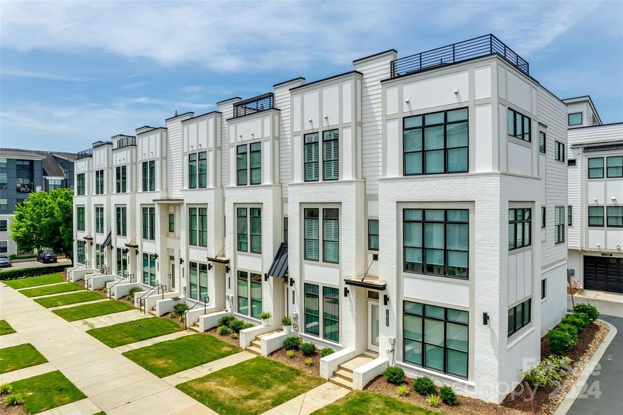 Experience convenient luxury living in this meticulous townhouse located in Wesley Heights/Lower Tuck! Enjoy the abundance of natural light from the nearly floor to ceiling windows, indulge in the expansive roof top terrace with stunning Charlotte skyline views. The kitchen boast sleek finishes with the waterfall quartz island, soft close drawers/cabinets, touch faucet, black stainless steel Samsung appliances. Upgrades galore- smart home electronic system, tankless hot water heater, hardwood flooring throughout, plantation shutters, designer lighting, rain shower head in primary suite. Walking distance to popular eateries, breweries, parks, Uptown, Panthers Stadium and much more!