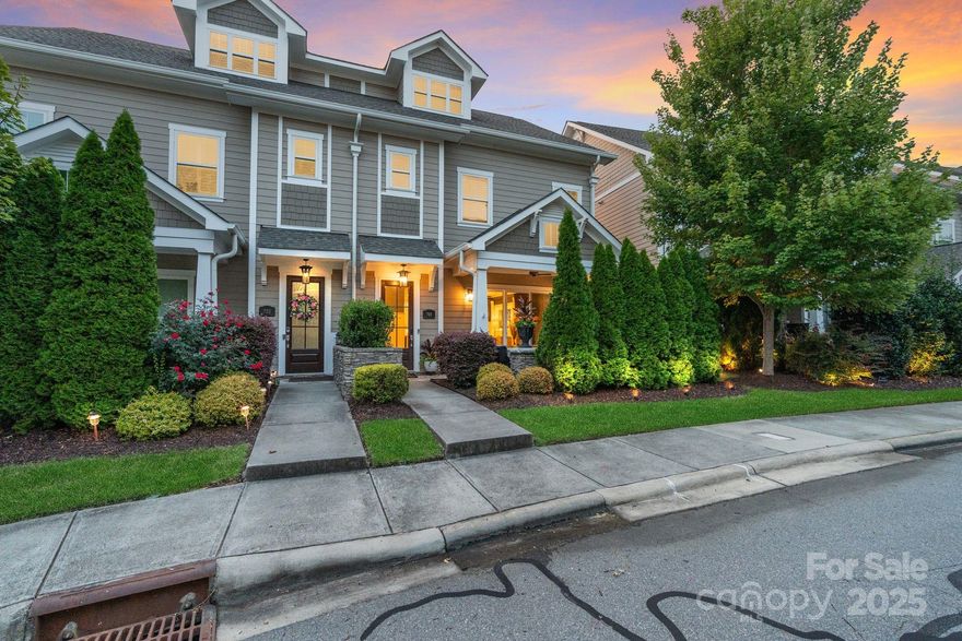 This is luxury living at its finest! You will not find a townhome in all of Davidson that offers the same level of sophistication as 748 Amalfi Dr. Transitional end-unit townhome in the coveted Davidson Bay and enjoys a peekaboo Lake Davidson view from the primary suite. Plus direct private lake access offering kayak storage. Spanning three beautifully finished levels, this 4-bedroom and 4.5 bath home showcase refined finishes throughout.  The main level is anchored by a show-stopping chef's kitchen featuring a European gas range, oversized vent hood, expansive island, and thick marble countertops with dramatic waterfall edges. Seamless flow into the dining and living areas - centered around the exquisite fireplace - create an ideal setting for both entertaining and everyday elegance. Sliding doors open to your own semi-private front entertaining space, offering effortless indoor-outdoor living. 

An elevator provides access to all floors.. The upstairs retreat includes the spacious Primary Bedroom, luxe ensuite, dual additional bedrooms with their own private baths, and a well-appointed laundry room. The top floor offers a flexible bonus/guest suite w/ full bathroom and wet bar. 

Premiums: in-ground irrigation, tankless WH, security system, window treatments, drop zone, built-ins, prefinished wood floors. Davidson Bay community: beach, paddlesport launch, sidewalks & trails; lawn care incl. Near Davidson’s Main St, shops, dining, greenways; quick access to I-77 and Uptown; lakeside living at finest.