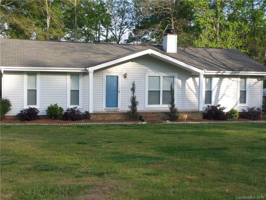 Beautiful home in pristine condition and ready to move in.  This 3 bedroom 2 bath offers an updated kitchen with SS appliances and an updated master bath with beautiful tile work and a walk in closet. This home sits on 1 acre and has a two car carport with a trail of nicely landscaped river rock and pavers leading you to your large deck. Experience the country feel while being very close to shopping, restaurants and the interstate. Septic Tank was pumped and inspected on April 24, 2016.