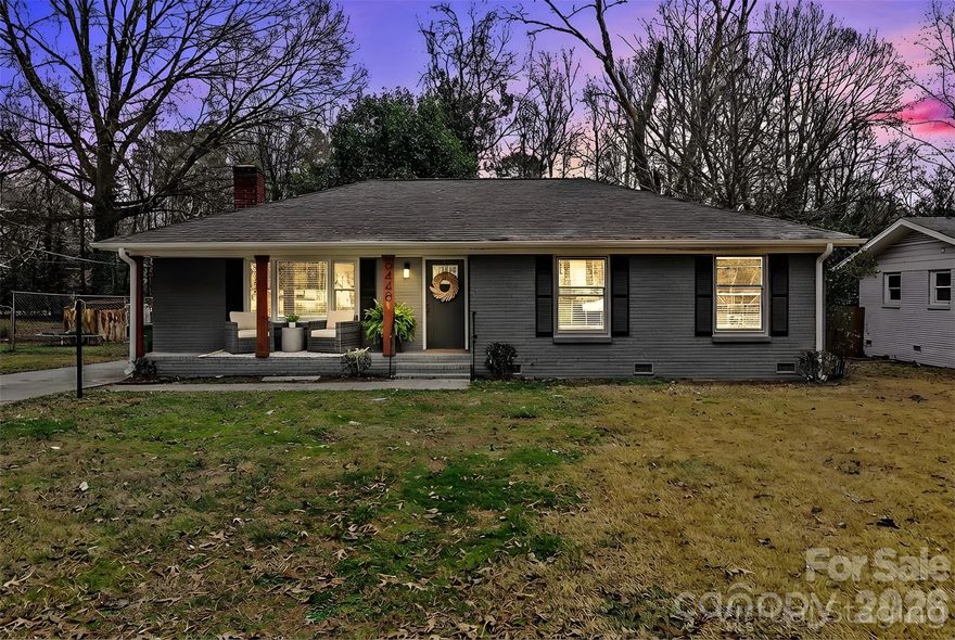 *THIS HOME QUALIFIES FOR 100% FINANCING, $15,000 RATE BUY DOWN, UP TO $5,000 IN CLOSING COSTS & NO PMI!!* Stylishly reimagined 3 bed 1.5 bath single-story home in highly sought-after Shannon Park. This stunning loyal blue classic brick home checks ALL the boxes!! Picturesque front porch w/ refinished wood beams provides the perfect place to begin your day in the Queen City, savoring a hot cup of coffee in the cool of the morning, or to enjoy your evening, unwinding under the beautiful Charlotte sunsets during the warmer summer months. Stepping inside, you're immediately welcomed by new durable LVP, a full interior paint job w/ neutral tones, contemporary light fixtures & large windows which reinvigorate each room. You won't be able to stay out of the updated kitchen, w/ its new granite counters, contemporary cabinetry, large double bowl sink, custom herringbone backsplash & new SS appliances (dishwasher, electric range & microwave). Bathrooms are refreshed w/ new vanities & flooring; full bath - also ensuite to the primary bedroom - features an updated tub + shower combo w/ modern tile surround. Screened-in porch is a priceless addition that provides a quiet retreat to enjoy the four seasons of Charlotte. Exclusive to the rapidly evolving and continually appreciating Shannon Park area, being competitively listed under tax value AND under $300K makes 5448 Kinsale an opportunity that you have to see for yourself. Don't miss out on the RARE opportunity to own one of Shannon Park's most beautiful homes, at an even better price!!