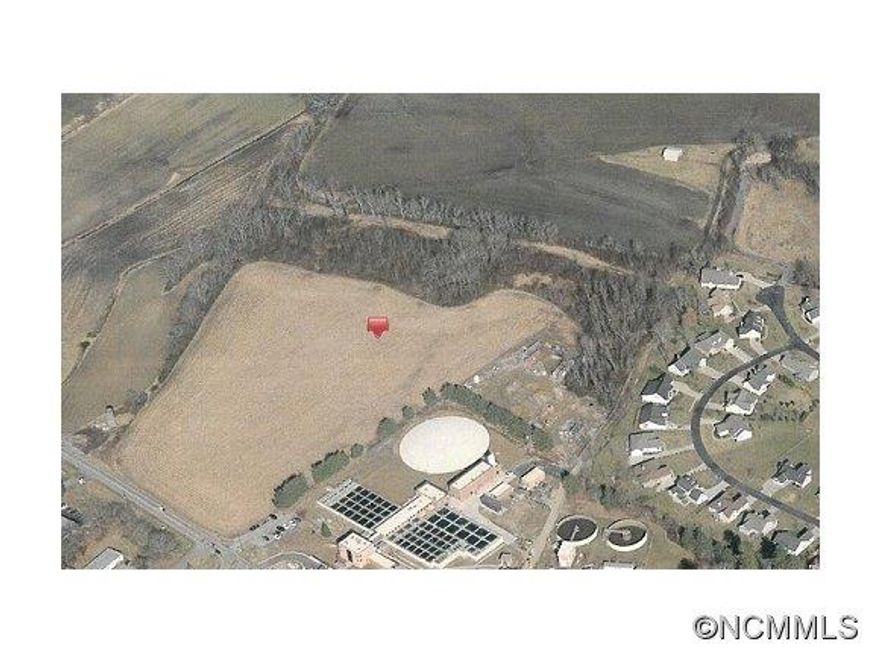 16.2-acre flat parcel ready for development. 12 acres out of flood plain with water and sewer. Adjacent parcel of 20 acres also available; can be combined for 36 acres.