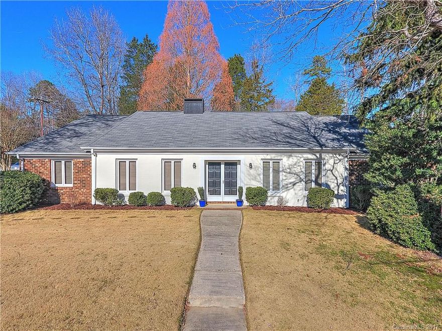 Well maintained & hard to find 4BR 2 1/2 Bath Ranch w/large sunroom (460 s.f. w/heating duct & separate a/c unit, not included in heated sf) plus 2 car detached garage on private fenced corner lot in sought after Stonehaven. Hardwood's & redone parquet floors. Updated Master & Hall bath. Formals & Den & Kitchen updated with granite,stainless steel appliances, painted cabinetry & tiled flooring. Please note: the FPL, chimney & detached garage sold in as-is condition. No known problems.