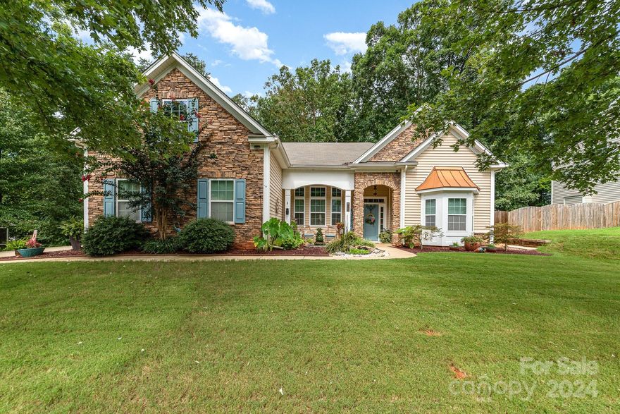 Welcome to beautiful Rosedale neighborhood in the heart of Lake Wylie! This meticulously maintained 4 bedroom, 2 bathroom home is sure to exceed your expectations. You'll be enamored with the soaring ceilings, reaching up to 12ft, as soon as you walk into the foyer as well as the and the split bedroom floorplan with a large living boasting a cozy gas fireplace. The well appointed kitchen offers 42in French countryside style cabinetry, granite countertops and fingerprint resistant appliances. The primary suite a well as 2 guest bedrooms are located on the main level with an additional room on the 2nd level. The fully fenced in private backyard is outdoor living at it best offering a covered porch, electric fireplace, composite decking, hardscape retaining walls, lovely landscaping and a swim spa! Don't miss your opportunity to own this one of a kind property!