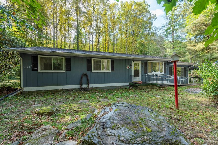 Welcome to this lovely home nestled on a picturesque piece of land in Weaverville. This well-maintained property is now looking for its next owner to add their personal touches and create their dream home. With four spacious bedrooms, there's plenty of room for a growing family or to host guests. One of the standout features of this property is its prime location. Situated close to the Blue Ridge Parkway, downtown Weaverville, and vibrant Asheville, you'll have easy access to outdoor adventures and local amenities. This property was once connected to Woodfin city water, and could be reconnected if desired. The well-maintained grounds offer ample space for outdoor activities and provides a serene and private oasis for your family. If you're seeking a home with potential and a fantastic location, this is your opportunity to make this property your own. Schedule a viewing today!