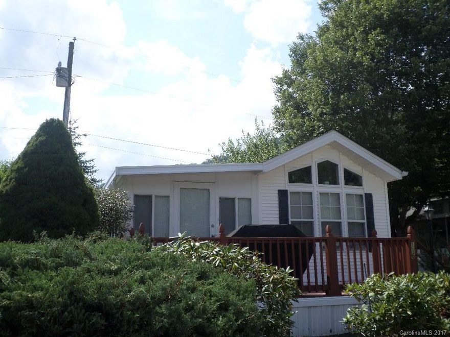 You won't believe how large this home is! Large living area 10x22, plus second smaller living area, 2 bedrooms & 1 bath & nice size kitchen, plus there is a 12x12 insulated & heated laundry/storage building. Home has new metal miniblinds. And there is cemented parking for 2 cars.  Flat yard nicely landscaped. All conviently located just off Moody Farm Road in Maggie Valley. Lp gas tank owned by seller, and taxes posted are both county & city.  Cannot find a bank to finance park model homes.