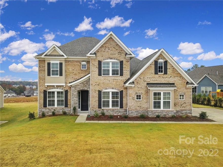 Welcome Home to this well-appointed NEW Construction North facing home READY now to move in located in the desirable community of The Estates at Covington. Upon entering this luxury estate home, you will be impressed with a soaring, 2 story foyer. The chefs, gourmet kitchen features white quartz countertops with an oversize island, 36” gas cooktop, ss hood and a walk-in pantry. The casual dining area and spacious gathering room with a gas fireplace is the perfect space for entertaining for the upcoming holidays! The deluxe, first-floor, primary suite includes a massive walk in closet and luxurious spa like bathroom with a soaking tub, dedicated shower & dual vanities. Additional bedroom on first floor makes this a highly desired floor plan. 3 car side load garage with spacious driveway. Prime location close to Ballantyne and all the shopping dining and entertainment with Low SC taxes!