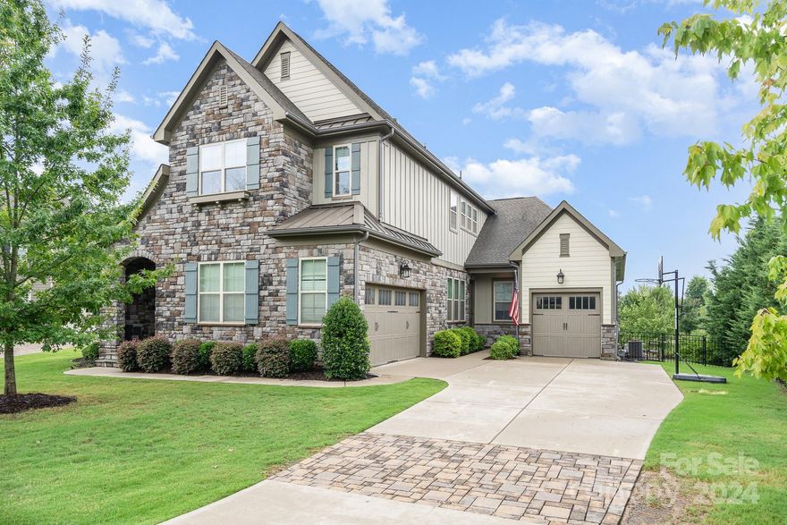 Welcome to this lovely home situated in the gated community of the Montage within the amenity rich Palisades. This home boasts with ample amount of space, hardwood floors, natural light throughout. 3 car garage with primary and additional room with en-suite on main level. Finished basement is a blank canvas for in-law suite, large entertainment space, game room and or office with over 2000 sq ft space. Three bedrooms and 2 full baths on the upper level with an open loft space and large unfinished storage room that has potential to be an additional bedroom. Laundry and launch area on main level. Screened in porch over looks large private yard. Home backs up to HOA natural woods area. This home sits in a cup-de-sac with large drive way for ample amount of parking. This is a home that has to many details to list them all. Water purification system in kitchen, full home air purification systems, walk in pantry and closets. Visit the community resident pool and sports courts.