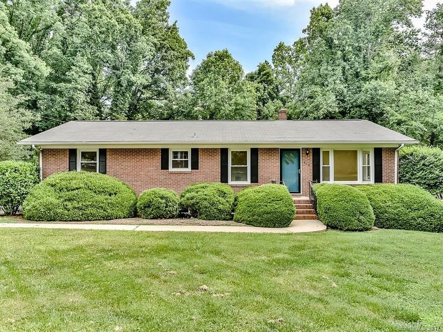 Darling bungalow within easy walking distance to Historic Davidson's South Main Arts District. So convenient to restaurants and shopping! Wonderful .44 acre lot in great neighborhood. New kitchen cabinets, quartz counter tops, sink, stove, microwave and lighting. Updated main level bath.  Main level has some hardwoods, recently replaced carpet/flooring, newer paint. Two bedrooms and one bath on main; one bedroom, one bath in basement. Walk-out basement needs work; could be a second living area.