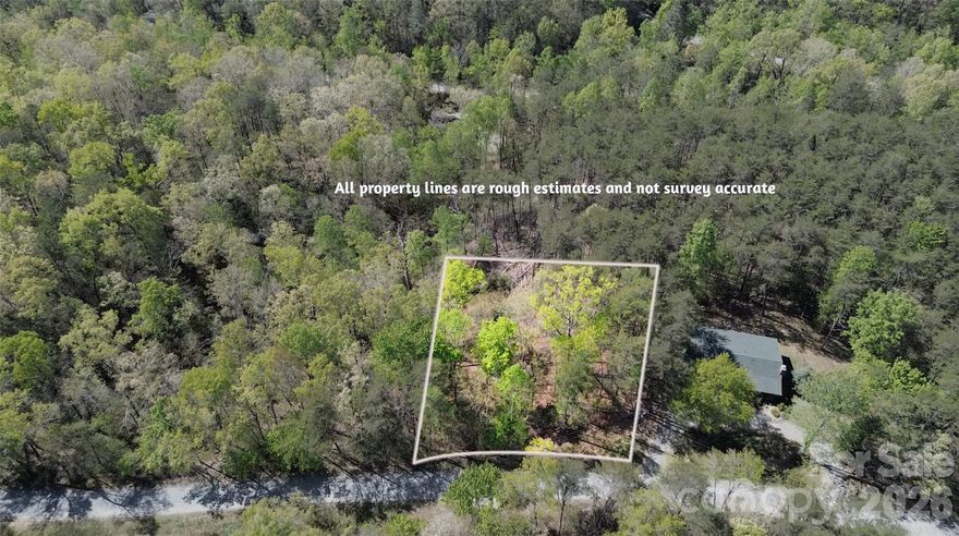 Discover the perfect canvas for your mountain getaway or forever home in the beautiful Riverbend at Lake Lure community. This expansive .51-acre wooded lot offers privacy, tranquility, and stunning natural surroundings just minutes from the crystal-clear waters of Lake Lure. Nestled in a gated community, Riverbend features two private lakes, a swimming hole, hiking trails, a picnic pavilion, and the serene Broad River – perfect for fishing, kayaking, or simply relaxing. With gentle terrain and multiple potential building sites, this lot offers flexibility for your dream home design. Enjoy mountain living while still being conveniently located near Chimney Rock, restaurants, shopping, and outdoor recreation. Whether you're planning a vacation retreat or a full-time residence, this lot provides the peace and beauty of nature with the perks of a well-maintained community.