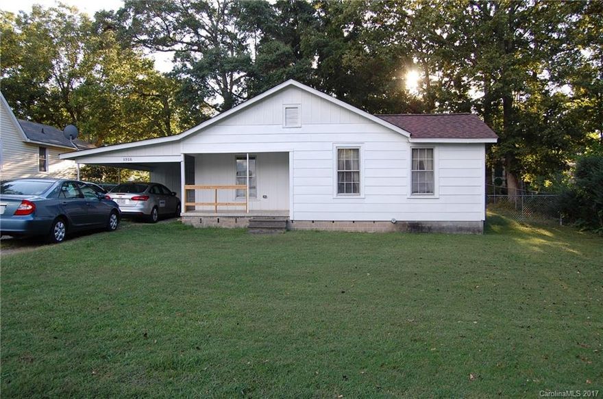 Welcome home to this cozy bungalow with rocking chair front porch. Large fenced in back yard with lots of shade. Building and 1 car carport. Replaced ceiling in LR/Kit - added moldings/paint late 2012. Newer electrical and some new plumbing. Architectural shingles 2012. Tile back splash in kitchen. Exterior paint 3 yrs ago. Updated bathroom w/tile floors, vanity, paint, fixtures. Convenient to NC Research Center, shopping, schools and restaurants.  Don't wait long or it will be gone!