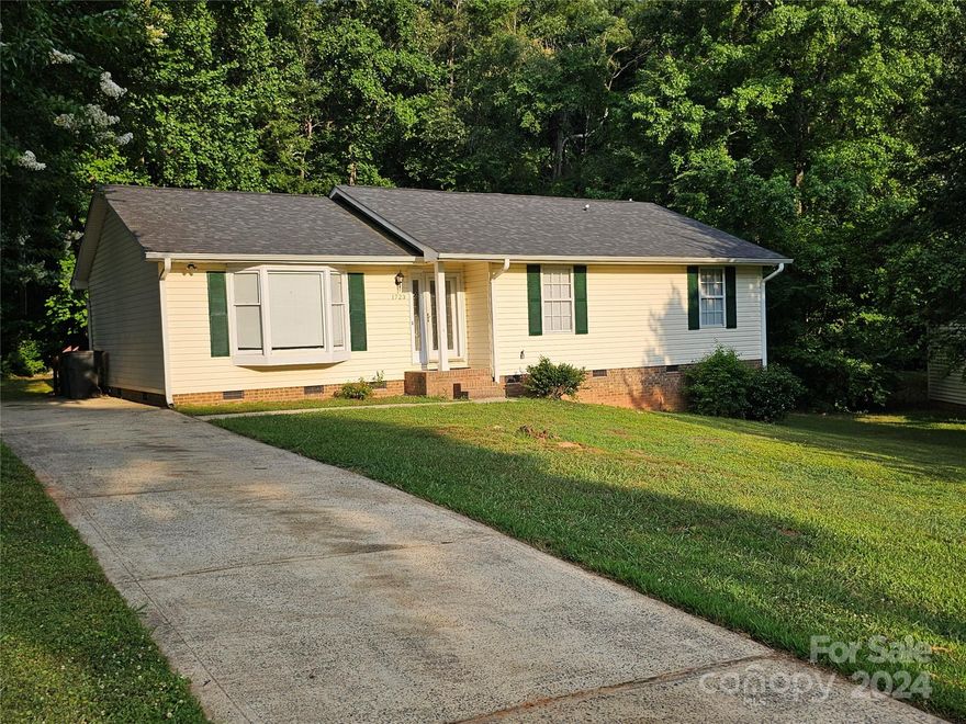 Come see this beautifully updated 3BR 2FB home in a quiet community just 15 mins West of Downtown Charlotte and just minutes from the Airport. This beautiful home has been refreshed with new paint throughout, updated fixtures, kitchen and bathrooms.  This home boast a large deck for entertaining family and friends.   The roof less than 5 yrs old.  The lot is spacious.  It's a wonderful starter home.