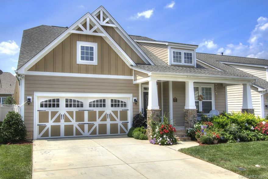 Beautiful Cooper floorplan with lawn maintenance included!  Front porch and rear covered porch, open kitchen with upgraded glazed cabinets and granite.  Large center island with bar and storage, 5 burner gas cooktop, butlers pantry with granite and wine cubby to DR. 5" wide plank Hardwoods throughout with carpet in the bedrooms, large owners suite with huge walk in closet, owners bath with tiled shower, raised vanity with dual sinks.  Fenced yard, community has pool and fitness center