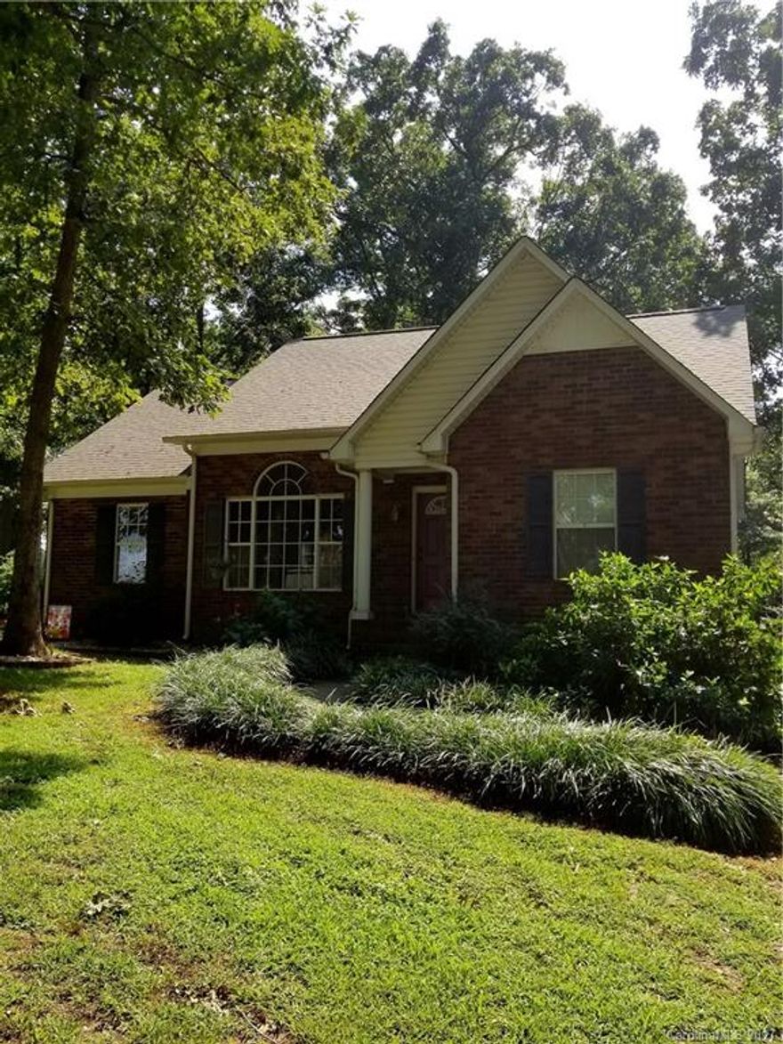 Beautiful country home nestled on private, wooded, water view, 1.12 acre lot. Updated kitchen with quartz counter tops and open floor plan. Large master bedroom with walk-in closets and double vanity in bathroom. Laminate installed recently, roof in Oct. 2016 and HVAC system in 2012. Enjoy entertaining in privacy on your back deck with this USDA eligible home. Move in ready, and waiting for the next owner. Won't last long!!