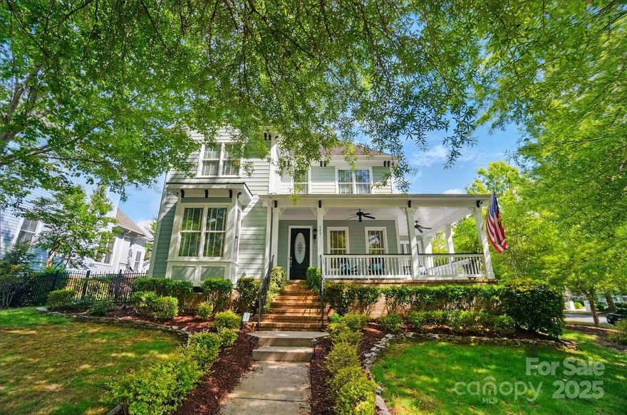 Step into timeless charm with this Evans Coghill built home in sought-after Baxter Village, right in the heart of Fort Mill. Just under 4,000 sq ft, this 4-bedroom beauty features a spacious primary suite on the main level, huge secondary bedrooms, a bonus room, and a versatile flex space/5th bedroom. Fantastic heated 3-season sunroom overlooks a private courtyard with a custom brick wall and pergola just perfect for year-round entertaining. There is a central vacuum, tankless water heater and gas grill connection. A rare find, the property boasts 4 garages totaling nearly 1,200 sq ft. with the detached one being heated. Positioned on a corner lot bordering a charming pocket park, it offers both serenity and community. A whole-home generator adds peace of mind. Enjoy Baxter's impressive amenities to include pools, tennis, playgrounds, a vibrant town center with eateries, shops, fitness options and more. Such a unique blend of character, comfort, and convenience! Welcome Home!