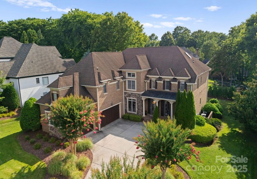 Stunning 3-story home nestled behind the gates of the Longview community, offering timeless elegance and thoughtful updates throughout. The expansive layout features 5+ bedrooms, including a main-level guest suite and a spacious third-floor bonus room perfect as an additional bedroom, media room, or flex space. Soaring vaulted and tray ceilings elevate the interior, while the primary suite boasts a sitting area, dual walk-in closets, and a luxurious en-suite bath. The gourmet kitchen showcases new KitchenAid stainless steel appliances (2024), paired with a Samsung washer and dryer (2024). Interior upgrades include fresh paint on the third floor, in all bathrooms, and across the home’s trim. Additional enhancements include new thermostats, a Ring camera system, and updated landscaping with mature privacy holly trees and fresh mulch. With two fireplaces, a 3-car garage, low Union County taxes, and access to award-winning schools, this home blends luxury and comfort effortlessly.